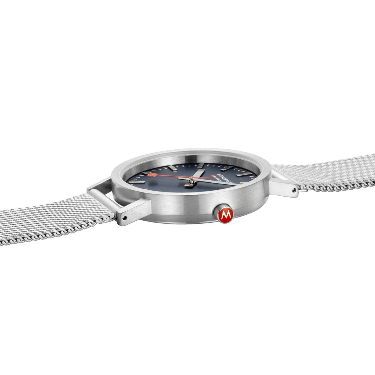 Mondaine blue dial watch case with silver mesh bracelet, side angle