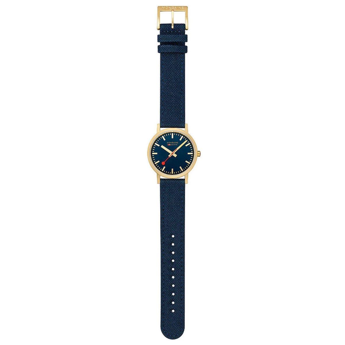 Mondaine watch with dark blue dial and deep ocean blue fabric strap, shown upright.