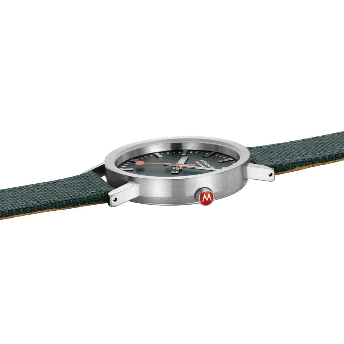 Side view of forest green dial watch case with green fabric strap and crown