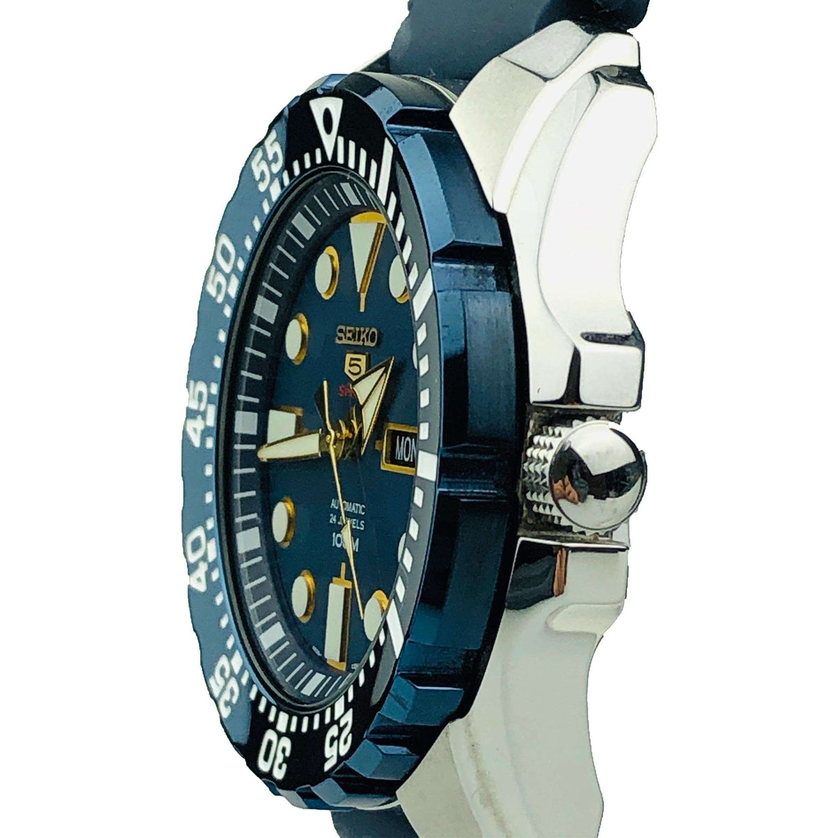 Seiko 5 Sports automatic watch three-quarter side view with crown and blue silicone strap