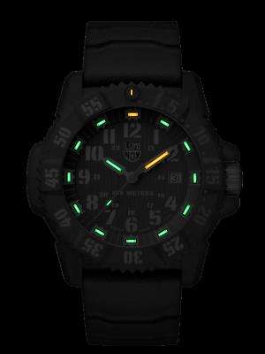 Men's black quartz watch with glowing green markers, orange second hand, black silicone strap