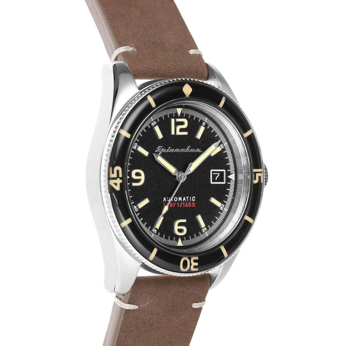 Men's automatic watch with black dial, gold accents, brown leather strap, angled close-up