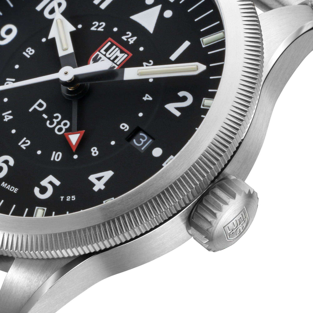Close-up of Luminox P-38 watch bezel and crown on black dial