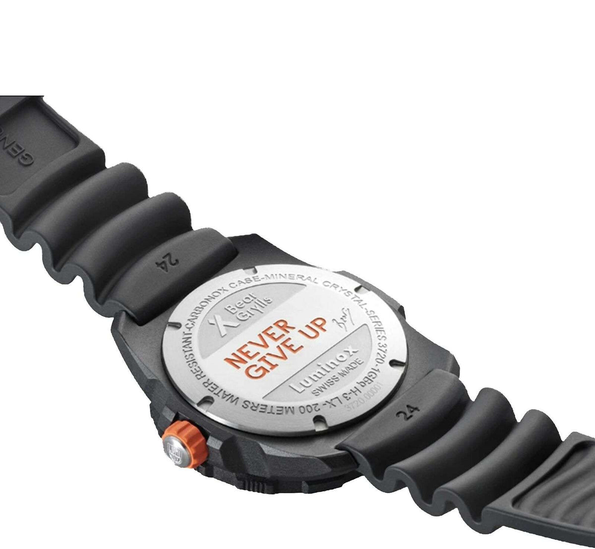 Black rugged watch case back with engraved text and orange-capped crown