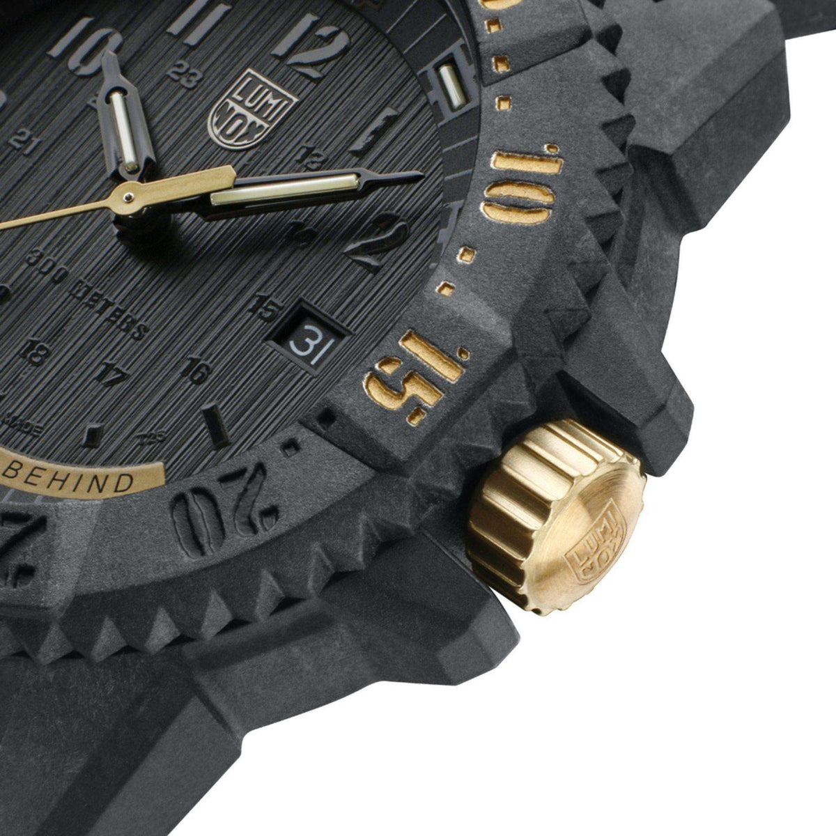 Luminox watch face with gold crown, date window, and rugged grey carbon-style case
