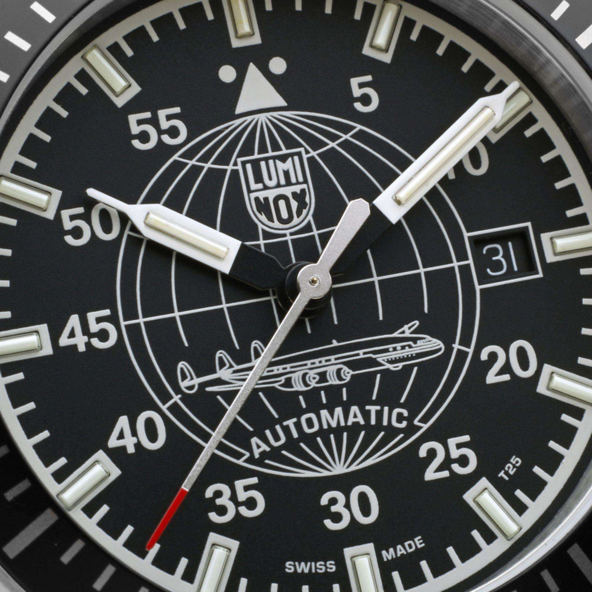 Luminox Constellation 9600 Series XA.9601.M close up view of black dial with Constellation aircraft motif and date window