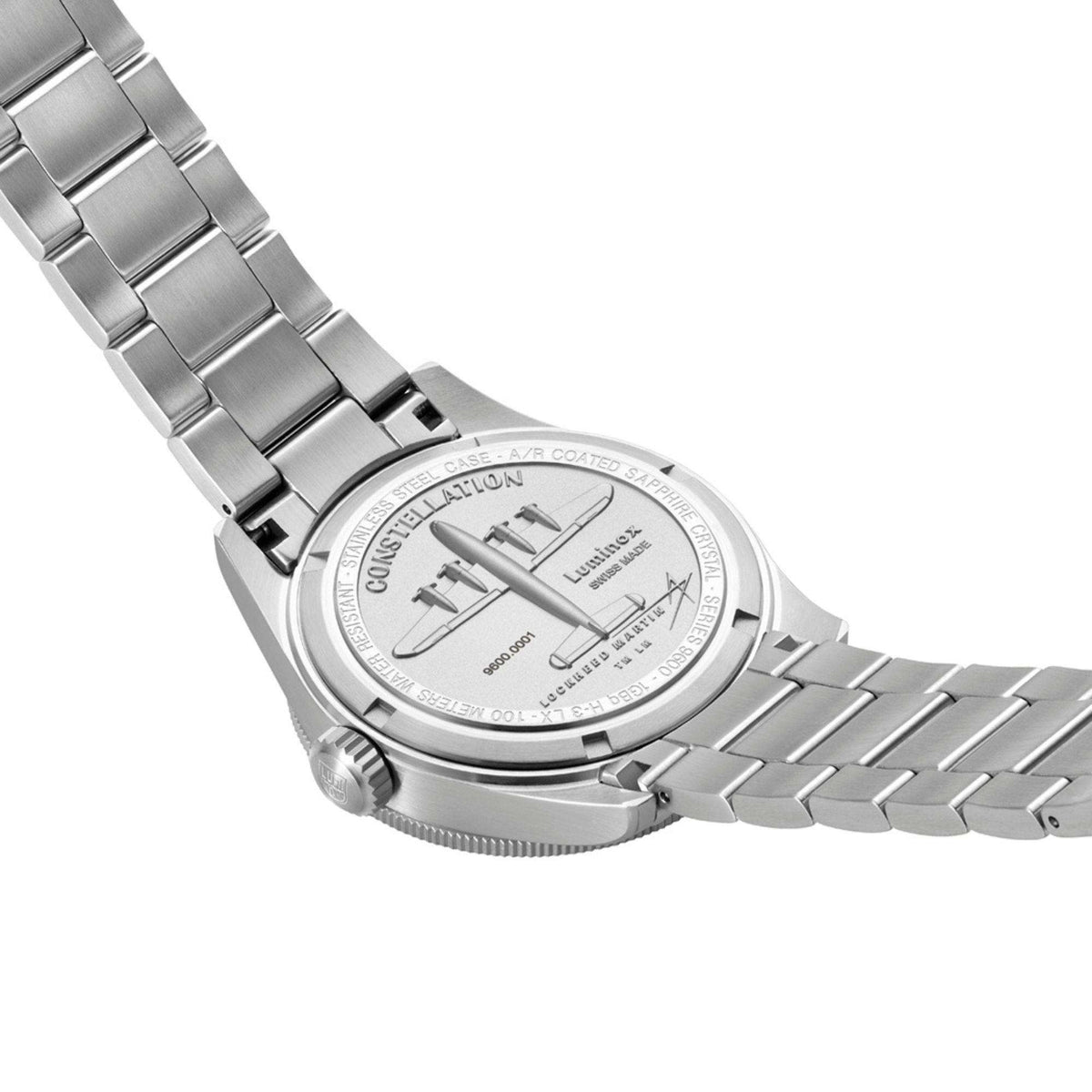 Luminox Constellation 9600 Series XA.9601.M view of engraved stainless steel case back depicting Constellation airplane and steel bracelet