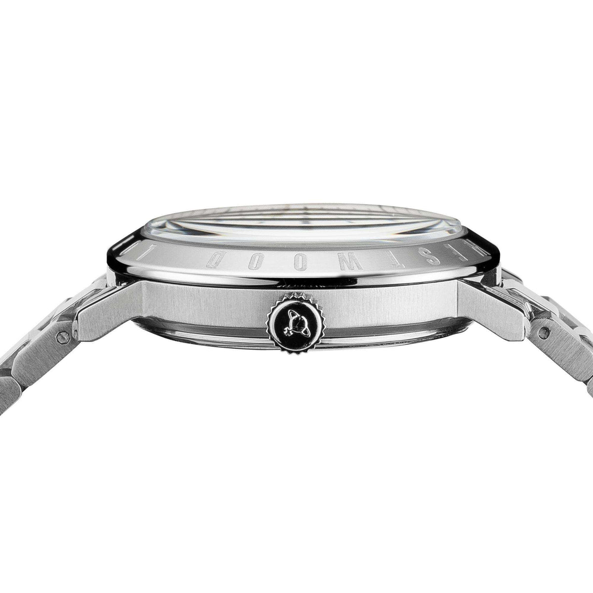 Stainless steel watch case with crown and round emblem on bezel, clear glass front