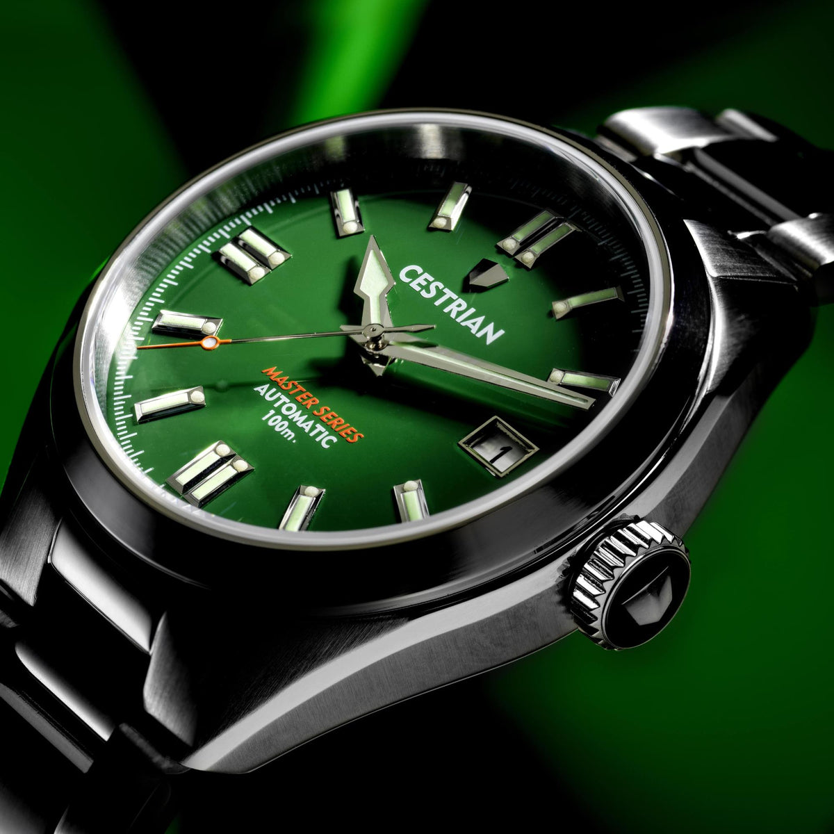 Automatic watch dial close-up, green face with Cestrian text, date and glowing hands