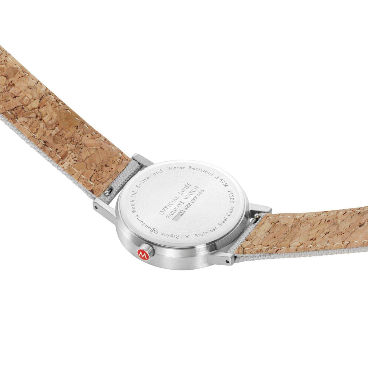 Mondaine Classic watch caseback with engraved text and gray textile strap