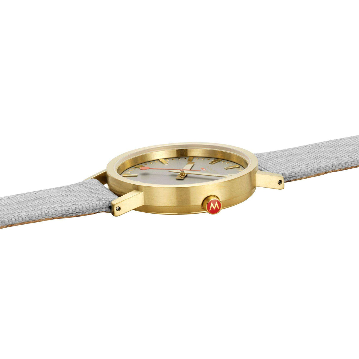 Mondaine quartz watch with gold case, gray dial, and light gray textile strap