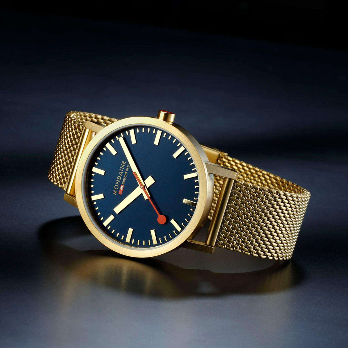 Mondaine Classic A660.30360.40SBM angled view highlighting blue dial display and steel mesh band
