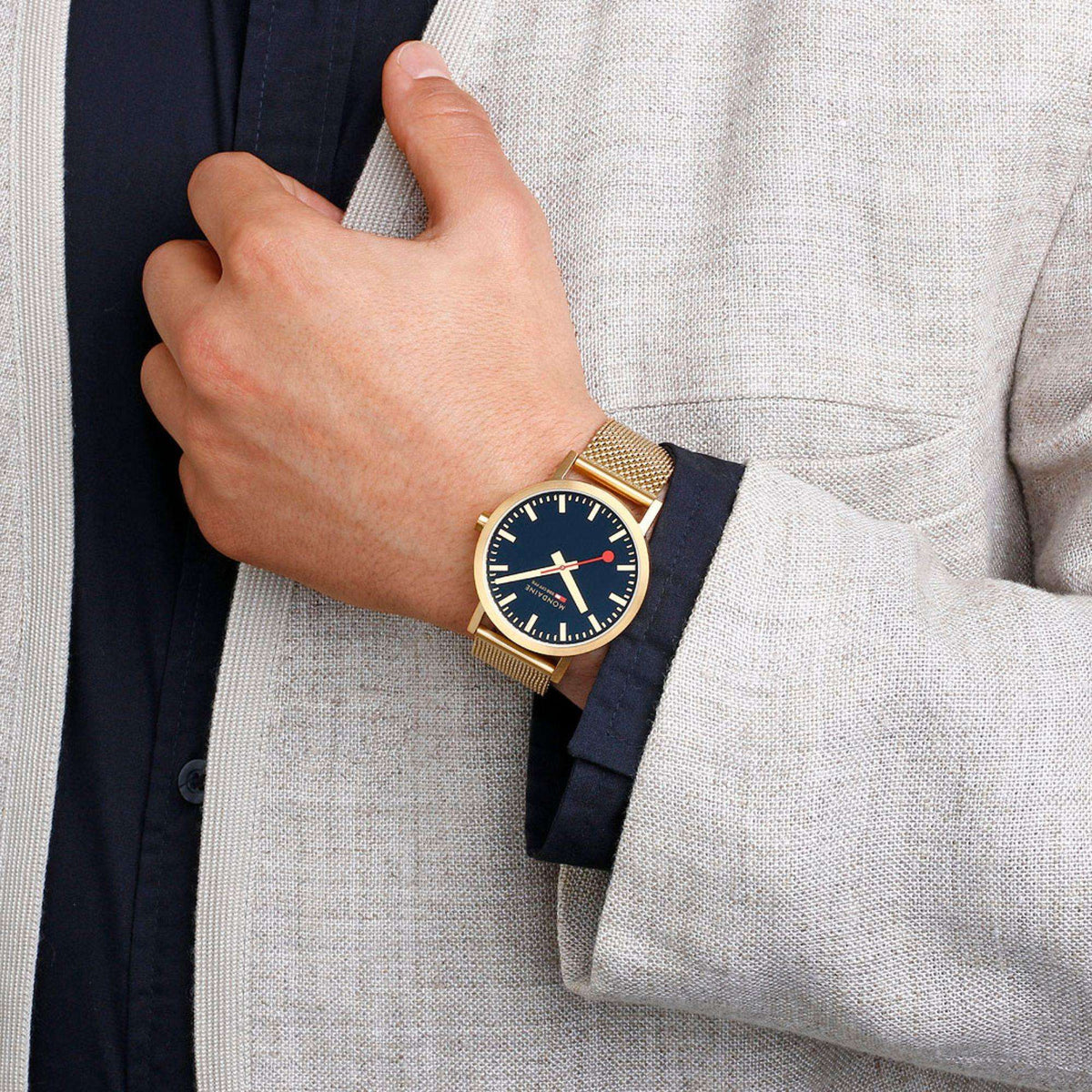 Mondaine Classic A660.30360.40SBM lifestyle wrist view paired with light jacket cuff