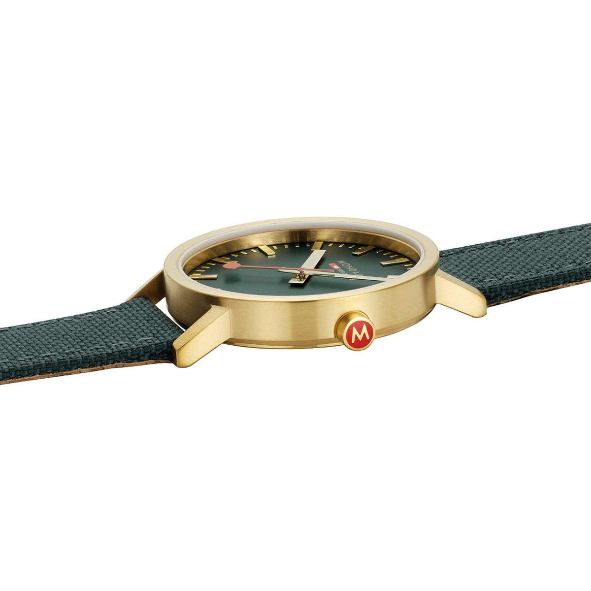 Gold-tone watch case side view with green fabric strap and caseback M logo