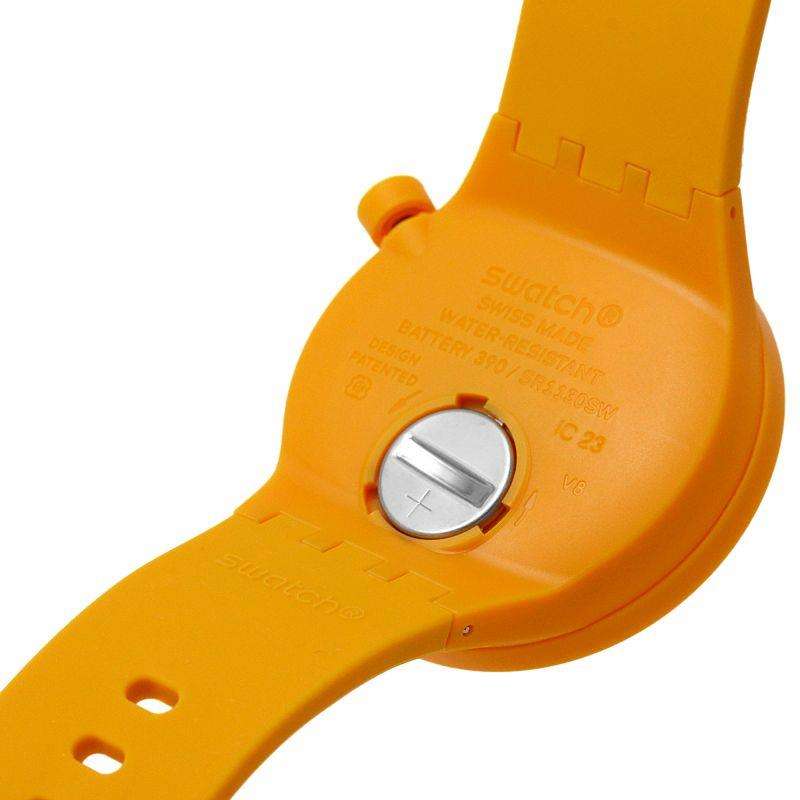 Orange Swatch watch back with battery cover and small plus/minus buttons