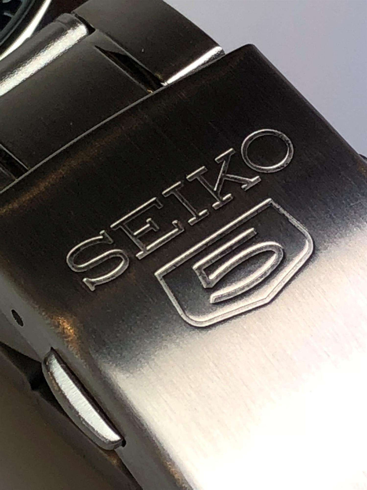 Steel watch bracelet clasp with engraved SEIKO 5 logo
