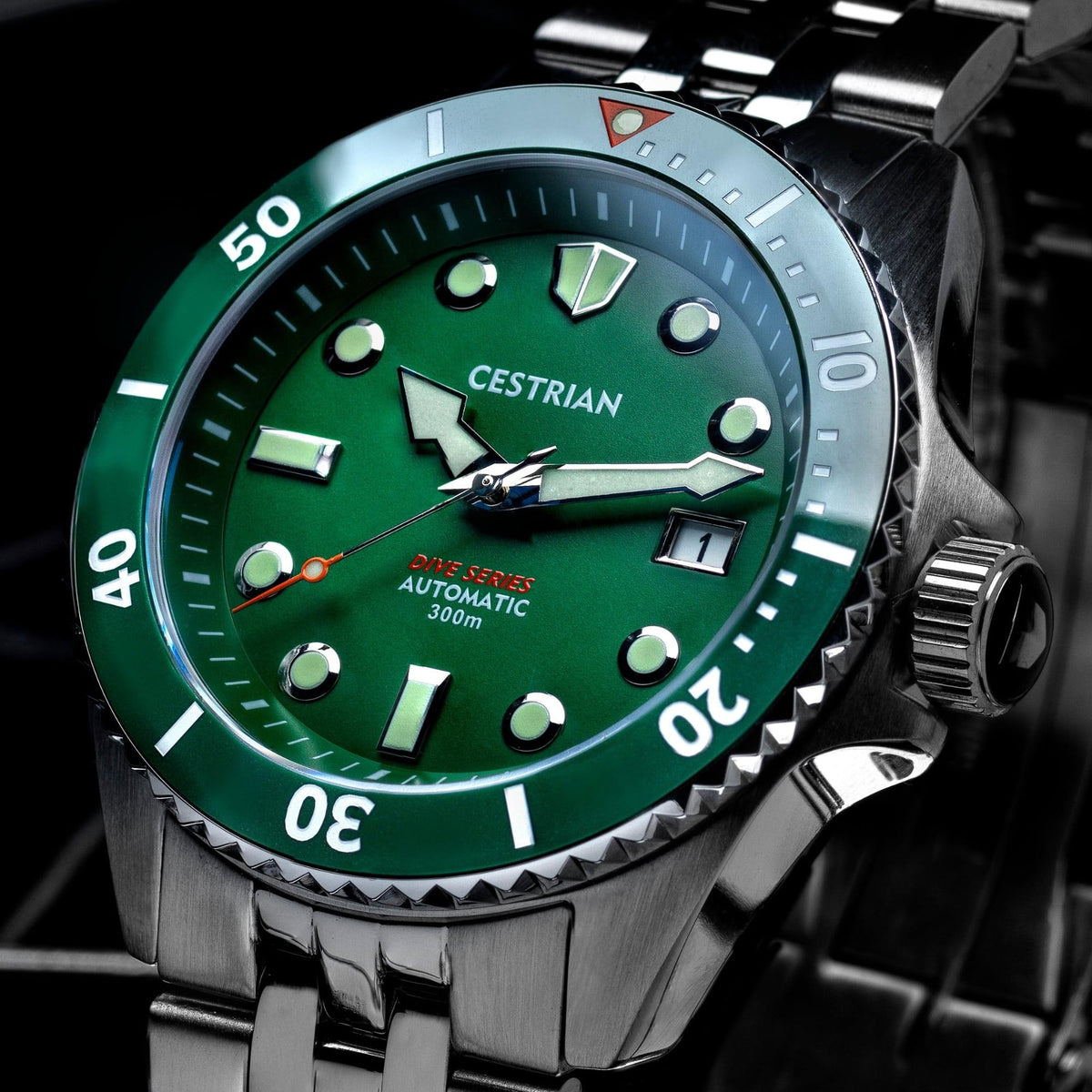 Close-up green dial dive automatic watch with steel bezel edge and markers
