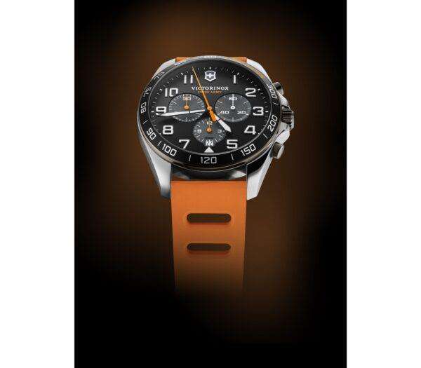 Men's quartz chronograph watch front view, black dial with subdials, orange strap