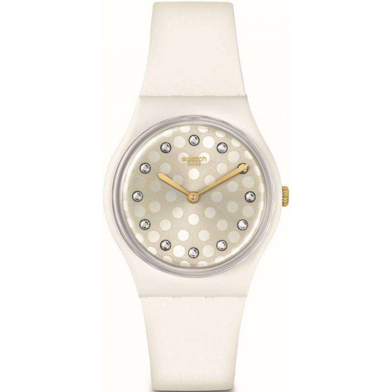 Swatch watch with white polka-dot dial, round silver case, and white strap