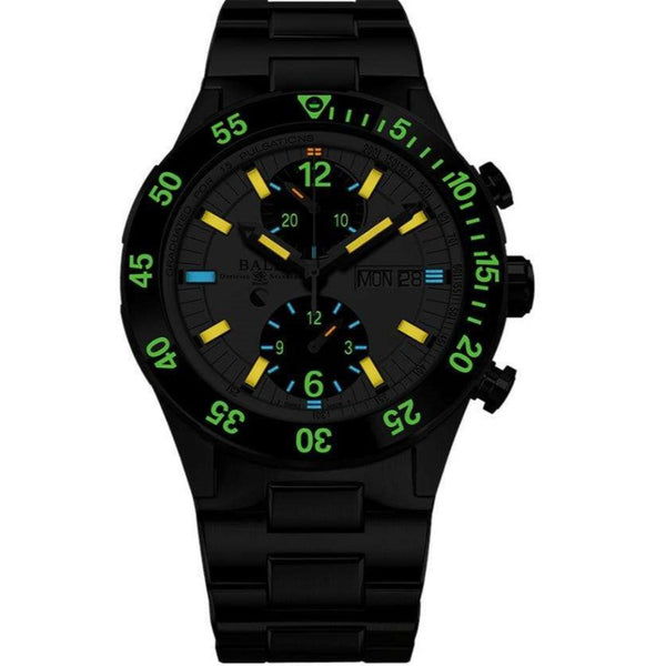 Men's black chronograph watch on black strap with green glow markers and date