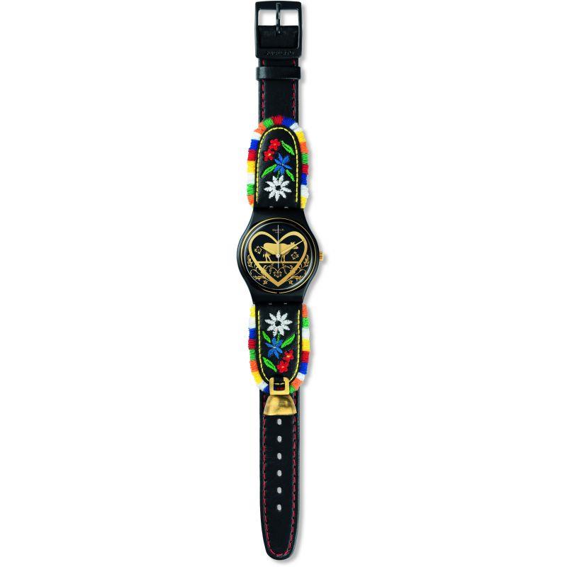 Black ladies wristwatch with gold heart dial and colorful embroidered fabric strap with buckle