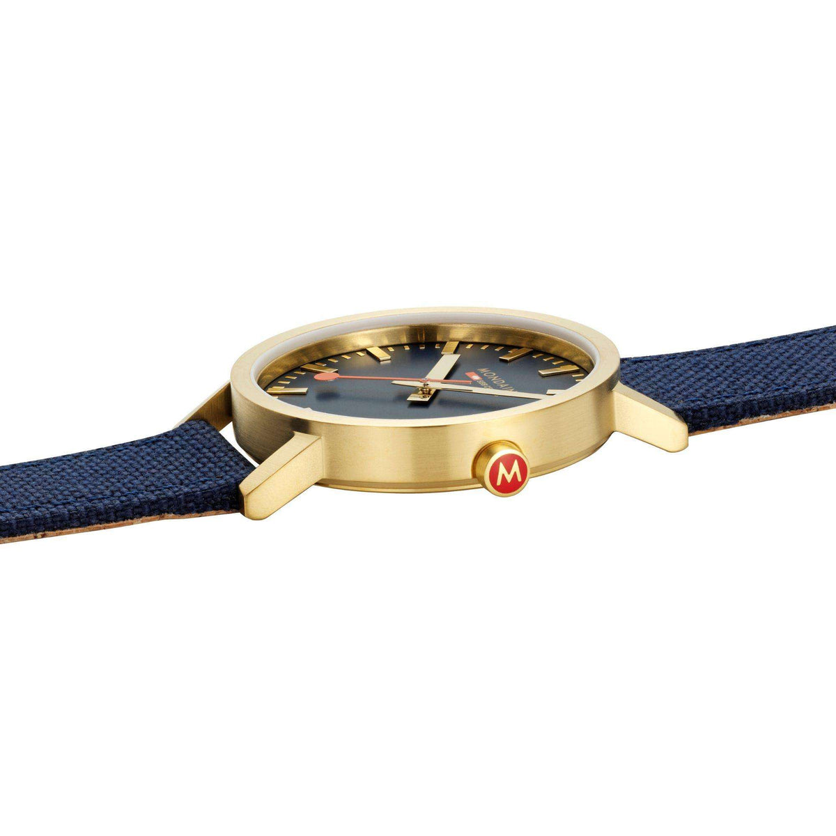 Mondaine Classic watch face in profile with gold-tone case and blue fabric strap