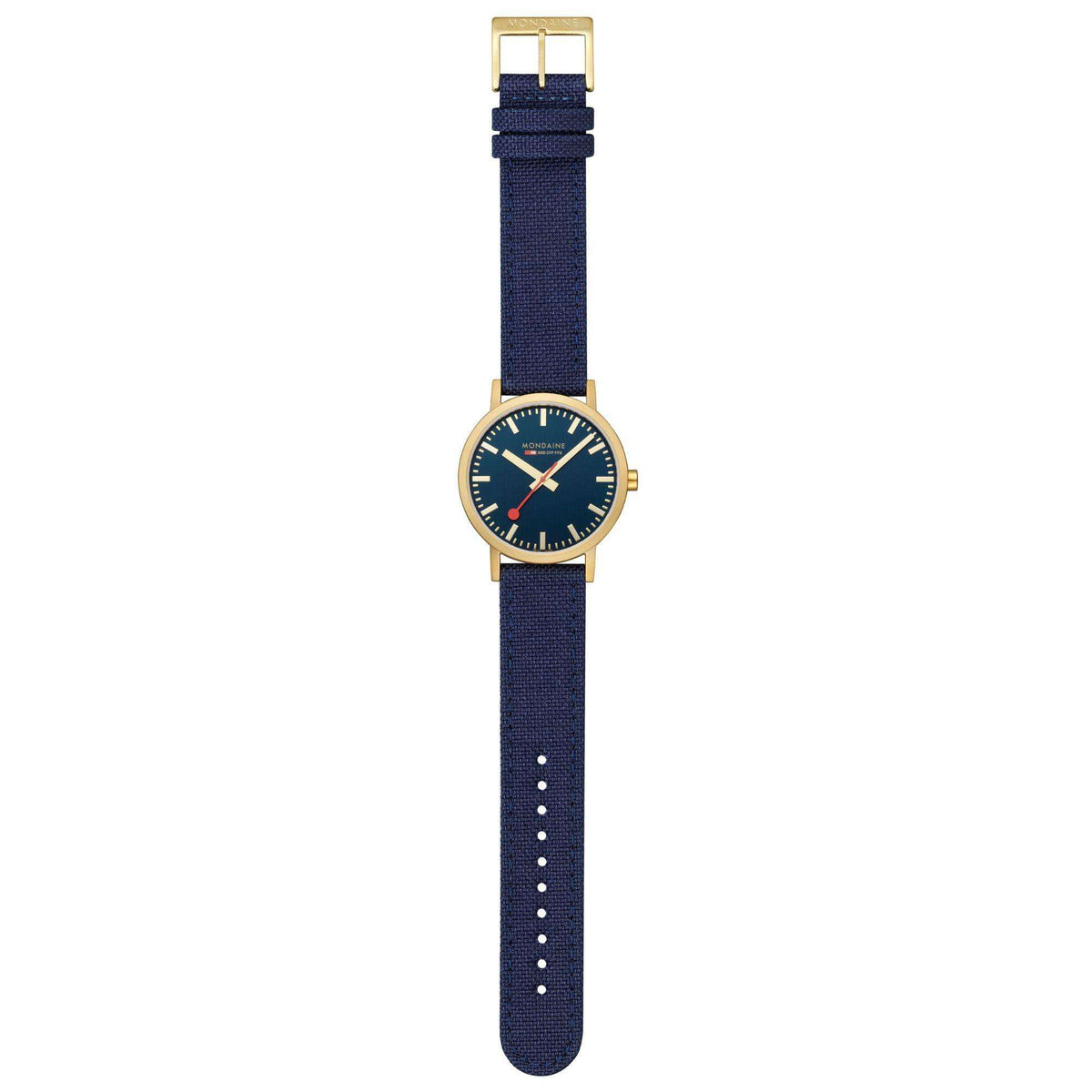 Mondaine Classic watch with navy-blue dial, gold-tone case, blue fabric strap on stand