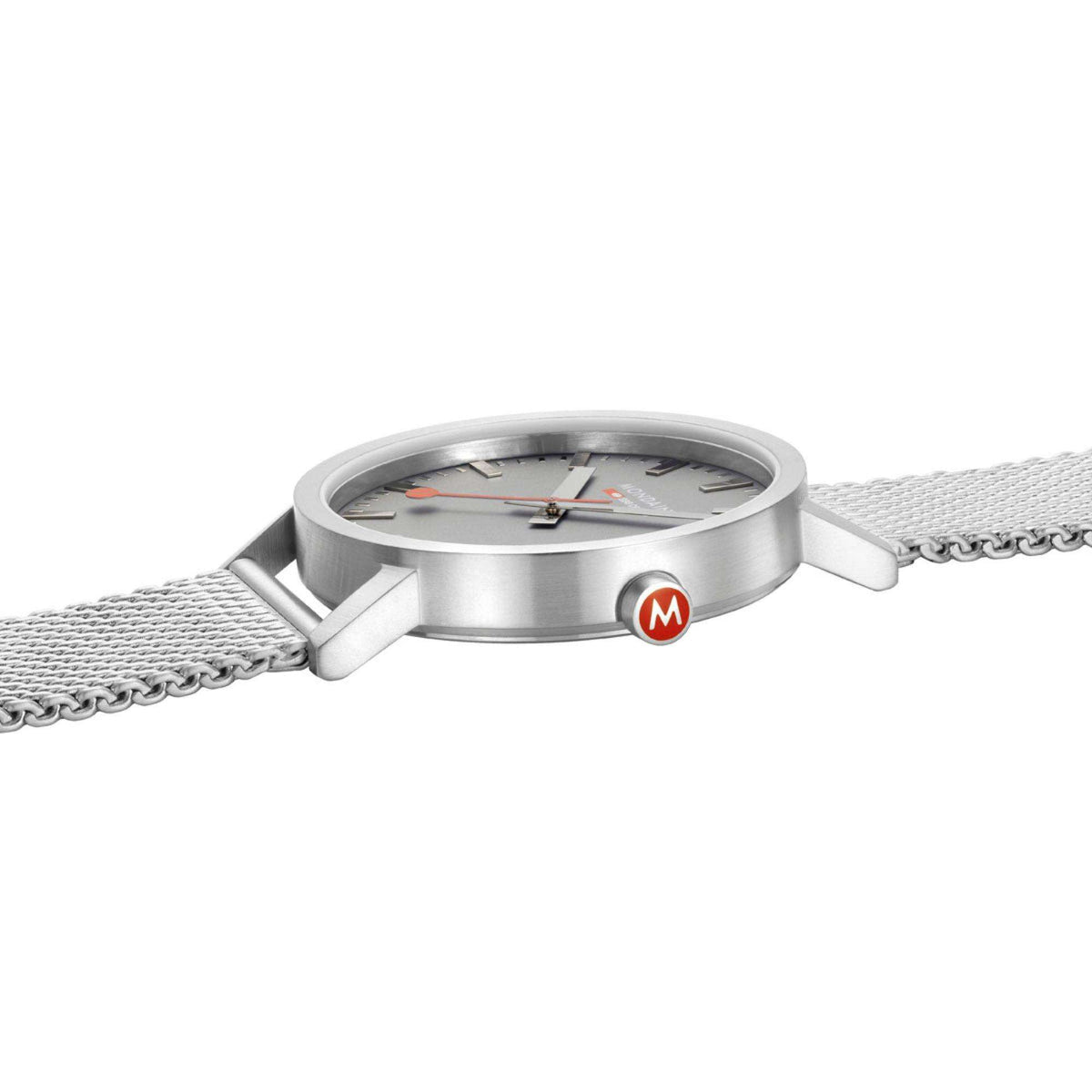 Stainless steel watch case with grey dial and mesh bracelet, side view