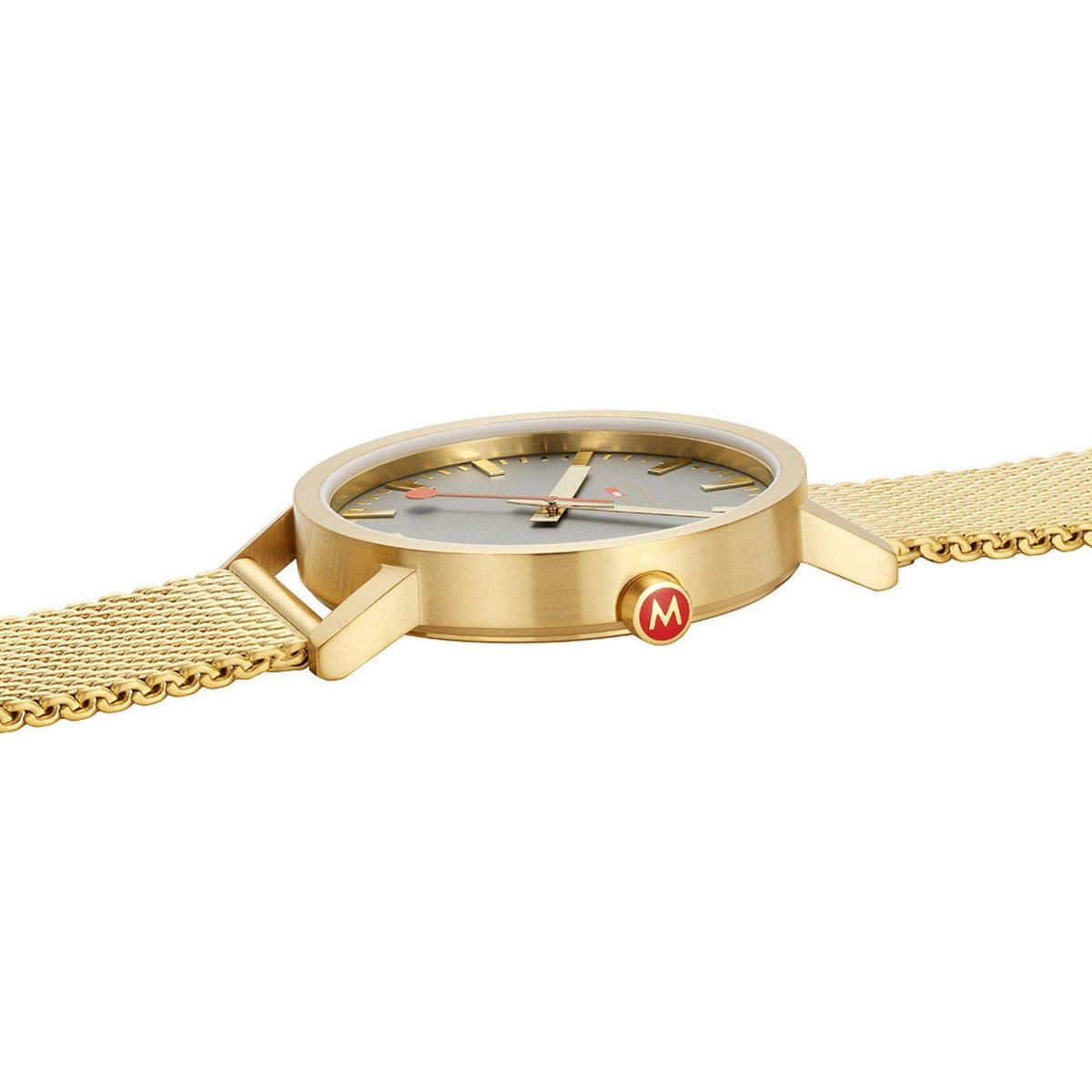 Gold-tone wristwatch case side with crown and mesh link bracelet, no dial view