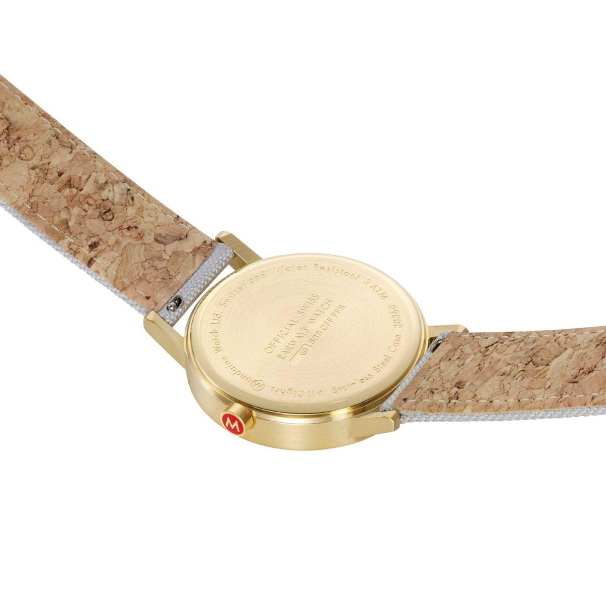 Mondaine classic watch caseback with gold-tone case and brown textile strap