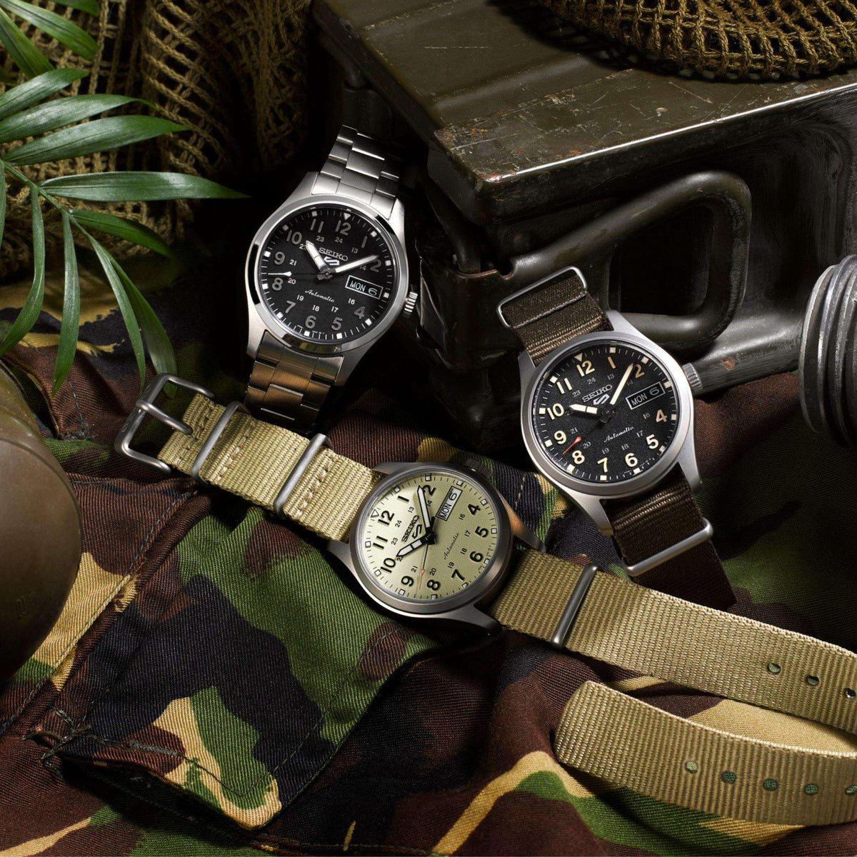 Seiko 5 Sports Midfield SRPJ85K1 showcased with other field watch variants group view