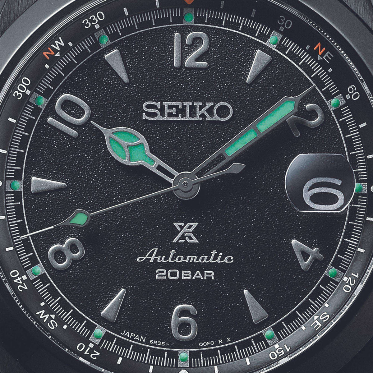 Seiko Prospex Black Series Night Alpinist watch SPB337J1 face with a black dial and green accents