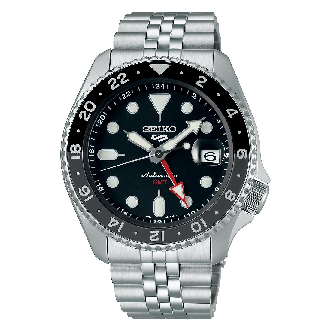 Men's black dial GMT watch with steel bracelet, black bezel, red GMT hand, crown at side