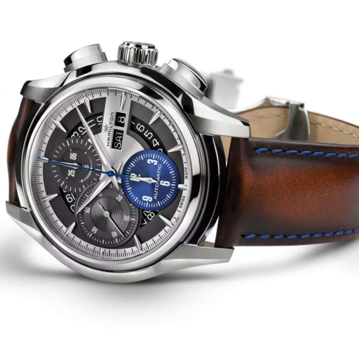 Men's silver automatic chronograph-style watch with brown leather strap and blue subdials
