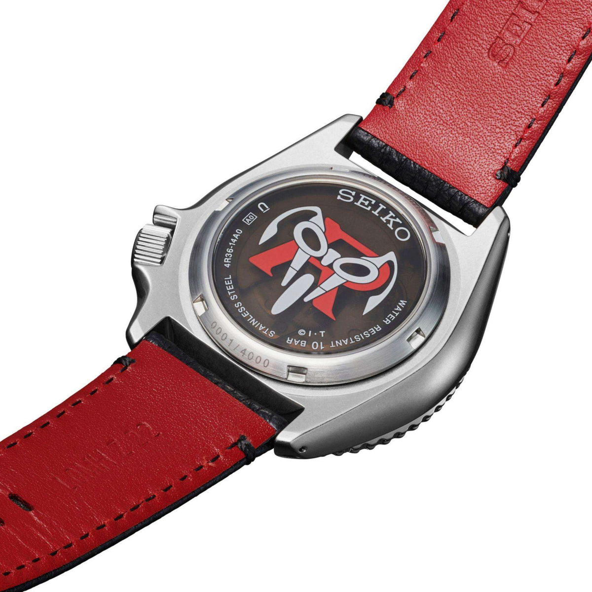 Close-up of the exhibition case back of the Seiko 5 Sports x Masked Rider mens watch SRPJ91K1, showcasing the red Masked Rider logo