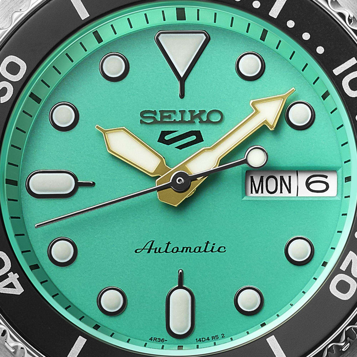 Seiko SRPK33K1 Teal Dial, showcasing the signature hands, circular hour markers, and dial text.