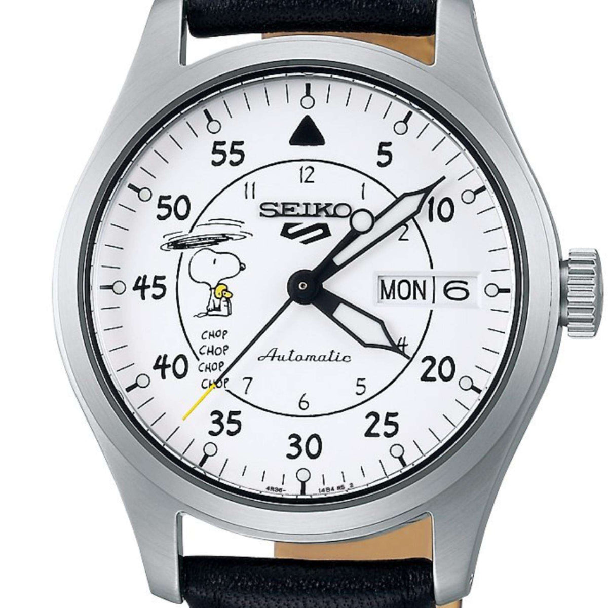 Automatic watch close-up with white dial and Snoopy graphic, black leather strap, steel case