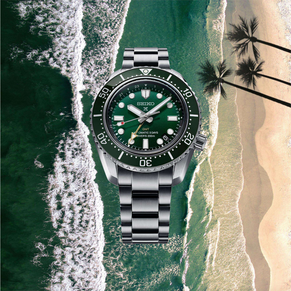 Seiko Prospex SPB381J1 front view overlaid on a beach shoreline aerial view