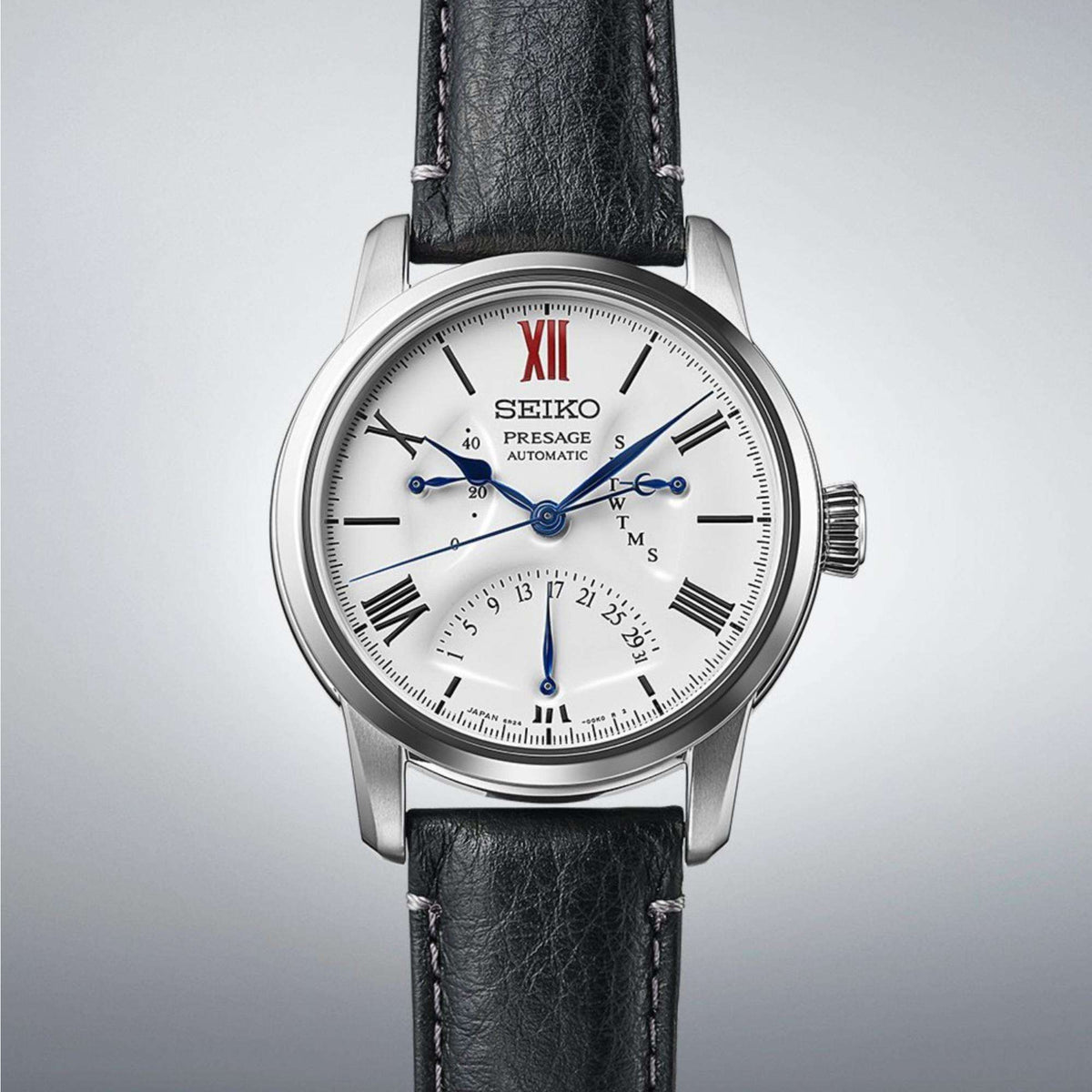 Seiko Presage SPB393J1 black leather strap detail and stainless steel case studio shot