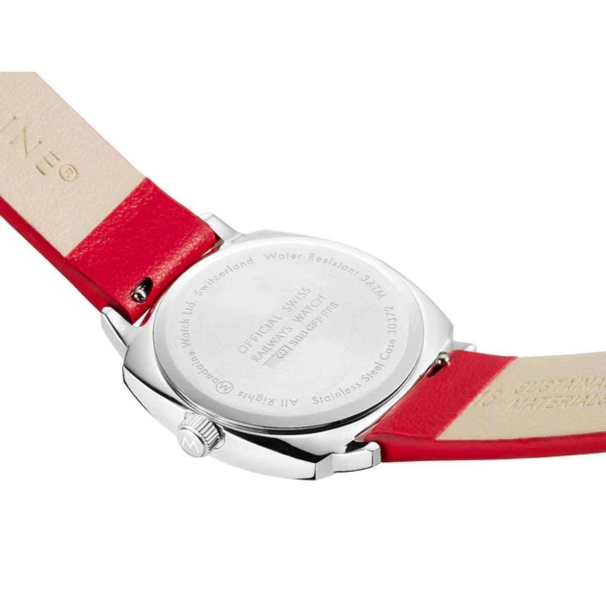 Mondaine quartz watch caseback with engraved text and red leather strap