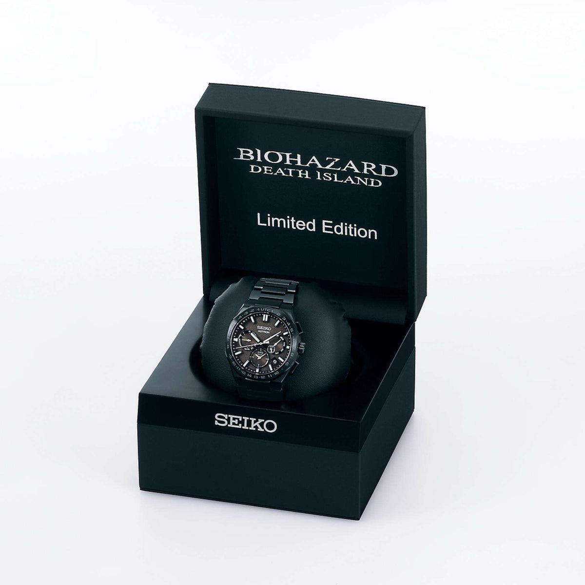 The limited edition watch on a black cushion inside its custom presentation box.
