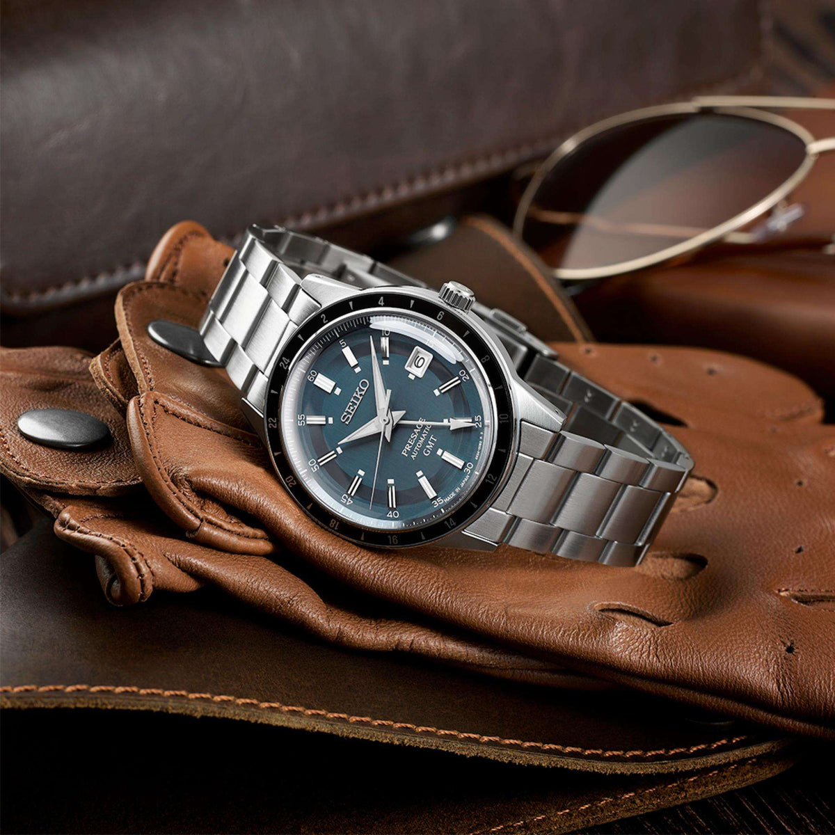 Seiko Presage SSK009J1 lifestyle view on brown leather driving gloves