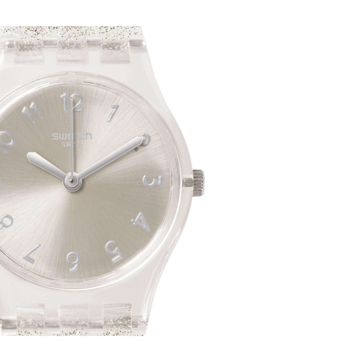 Close-up of silver dial with stick markers, Swatch logo, and clear case edge