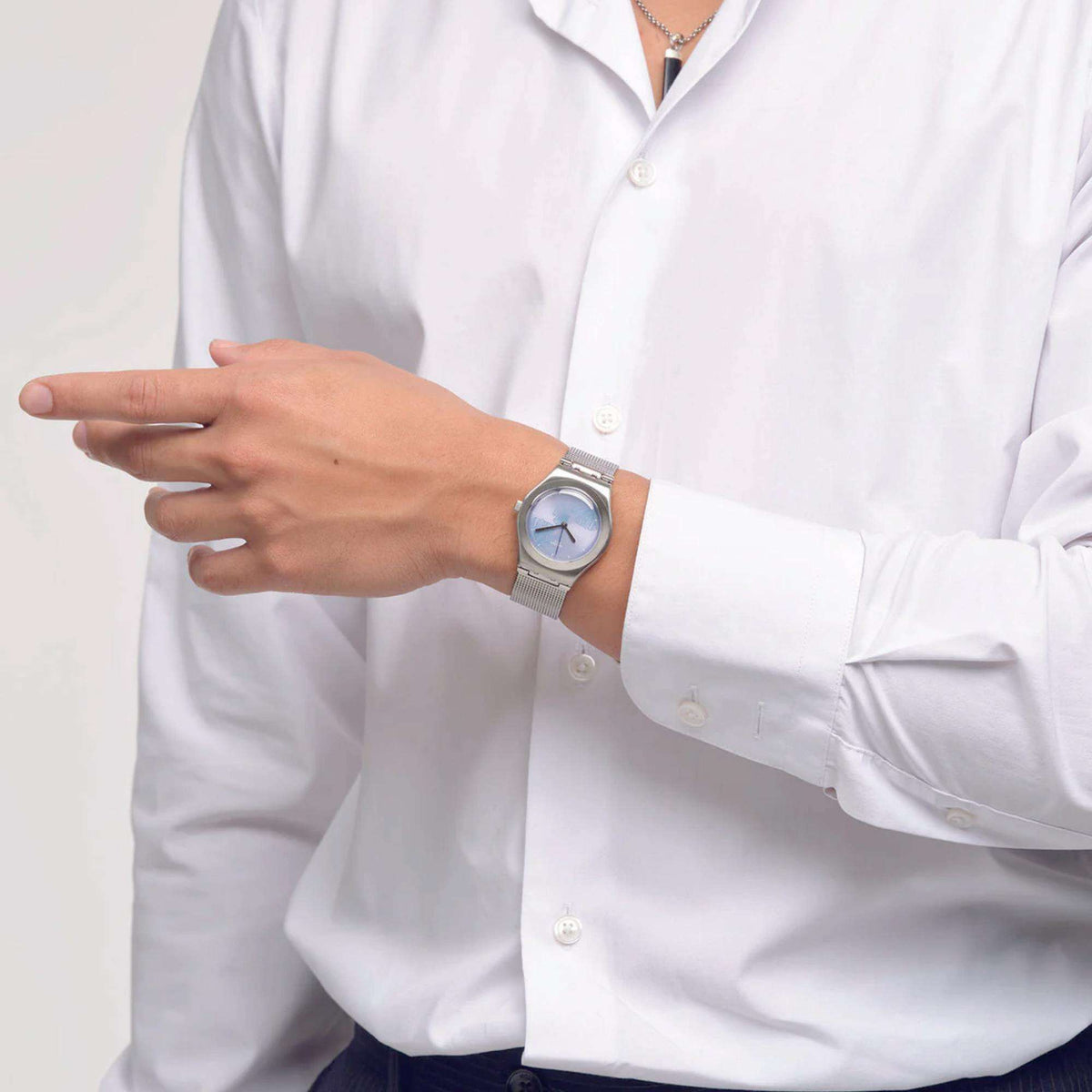 Ladies silver-tone wristwatch with light blue round dial and slim strap
