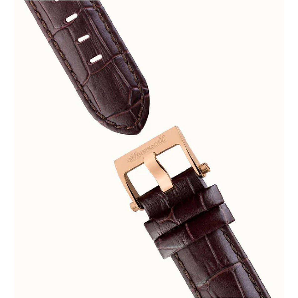 Brown leather watch strap with buckle and pin clasp, shown from an underside angle