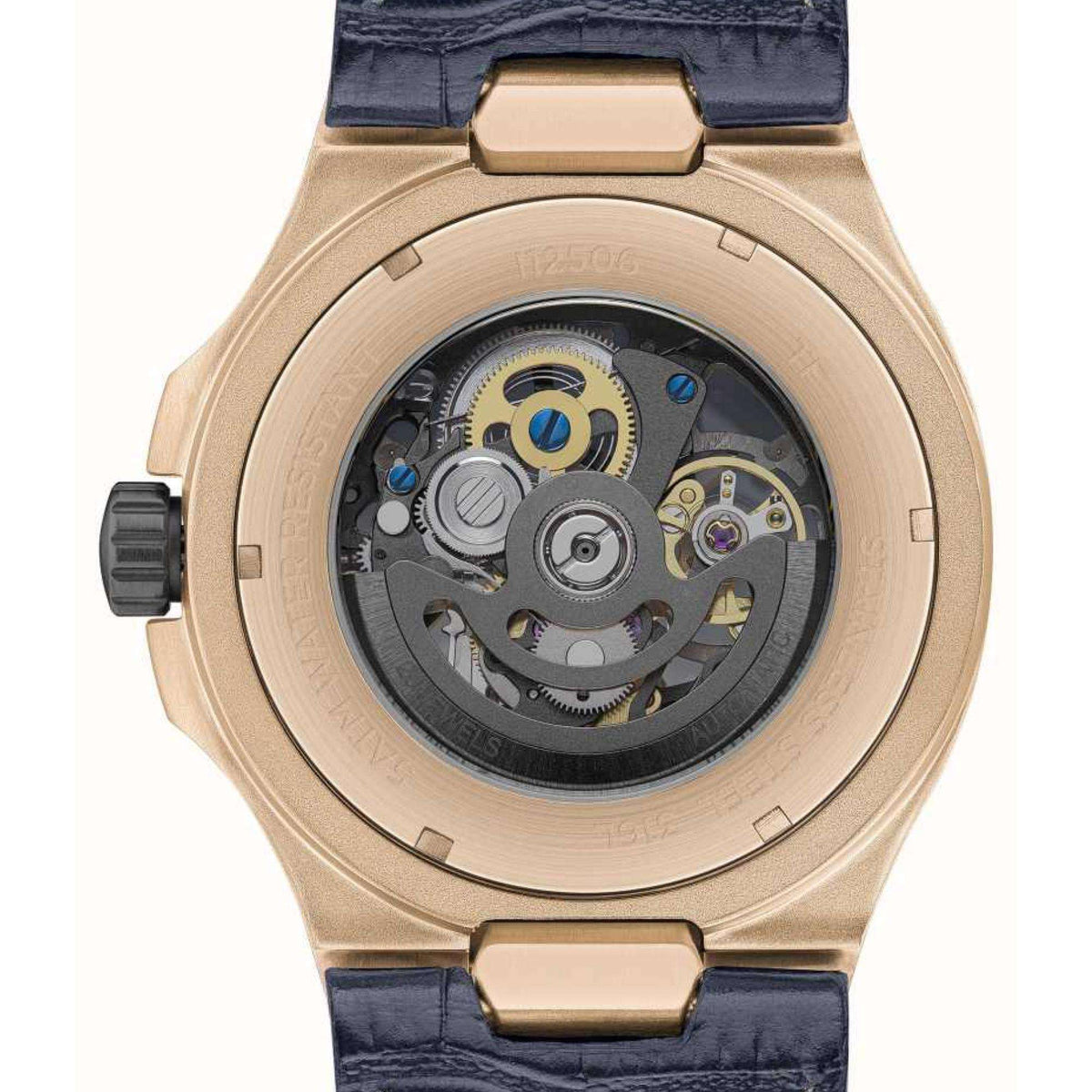 Men's watch back close-up showing automatic movement under dark blue leather strap