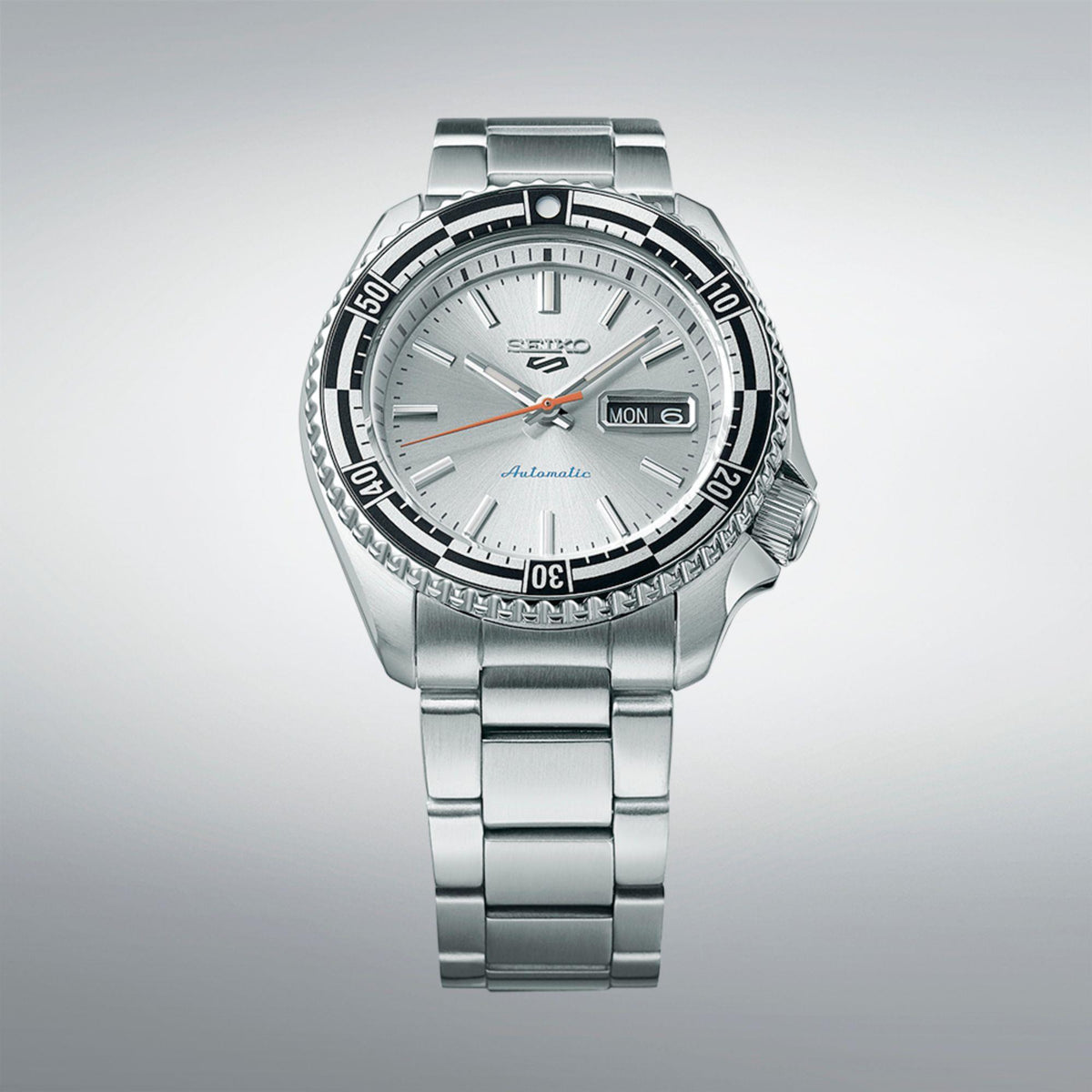 Silver stainless steel Seiko 5 Sports men’s watch with silver dial and day-date window