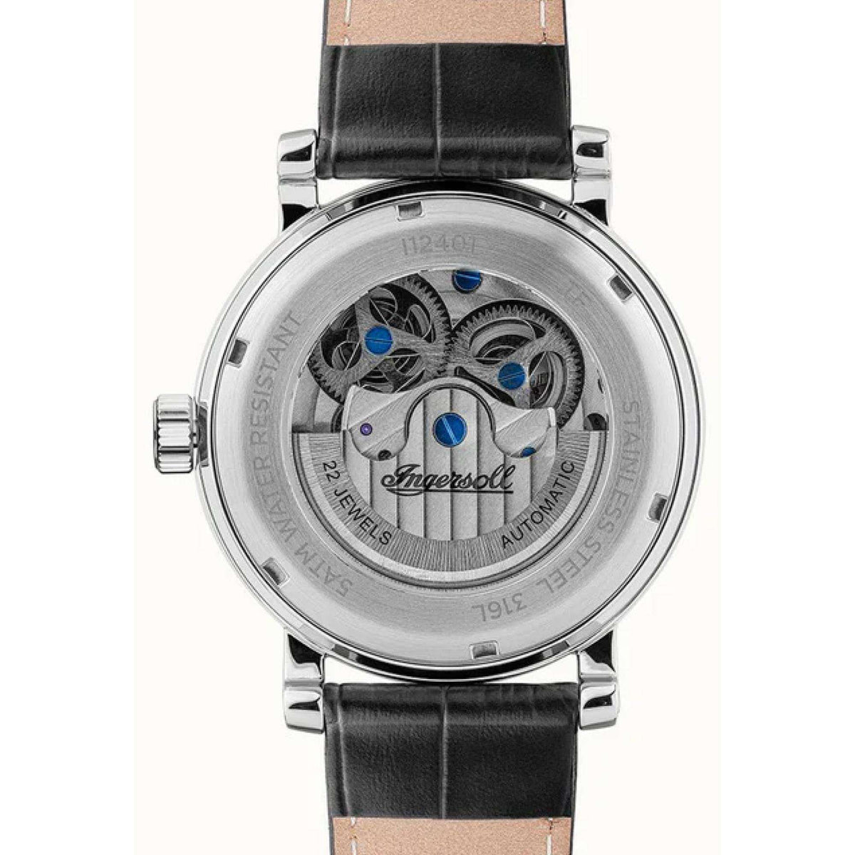 Back view of men's automatic watch with black leather strap, circular engraved case and gears