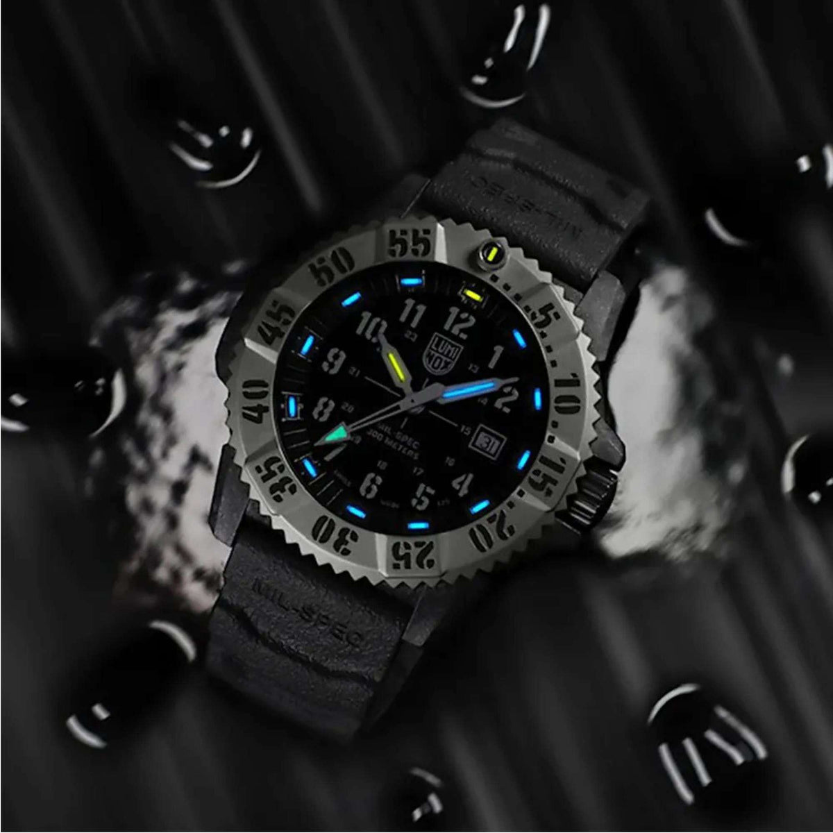 Luminox MIL-SPEC quartz watch with glowing blue dial markers on black rubber strap