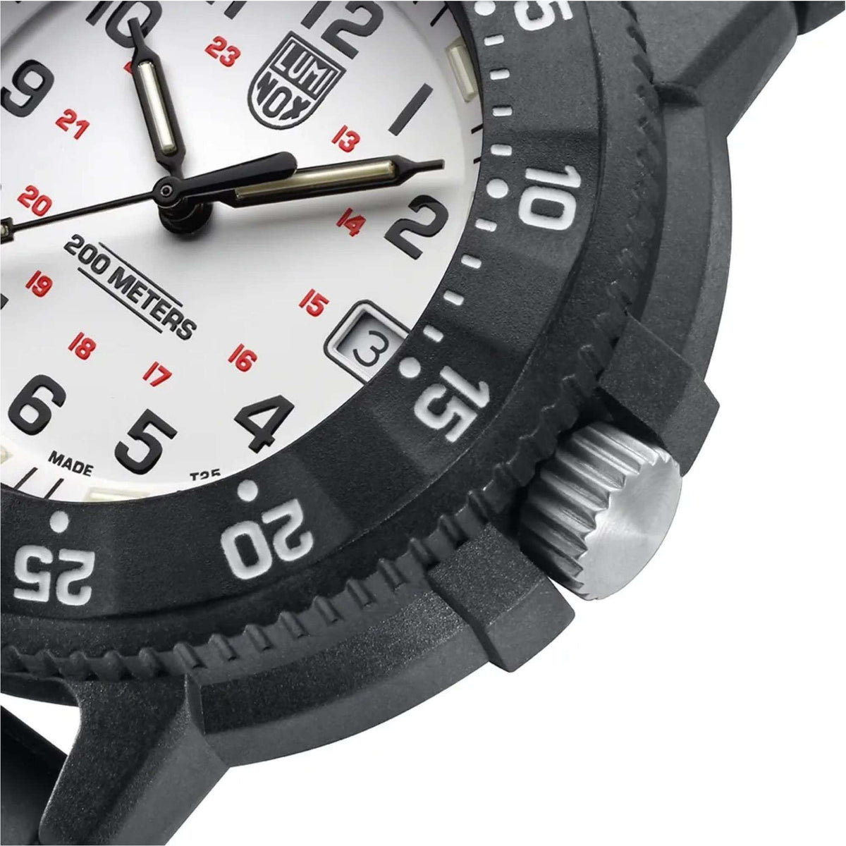Men's dive watch side view with black rubber strap and textured bezel markings